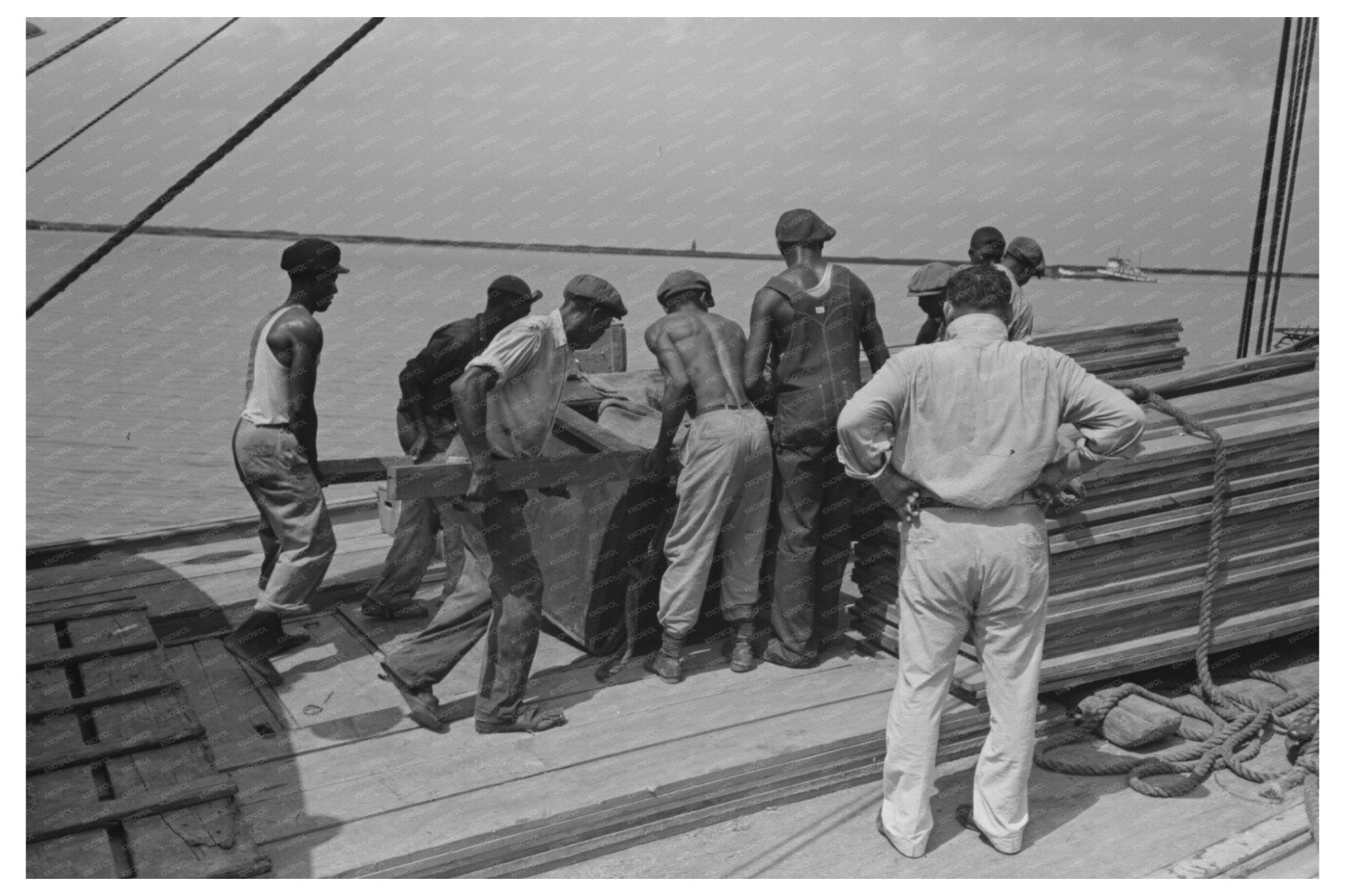 Stevedores at Work on El Rito Bow Louisiana 1938 - Available at KNOWOL