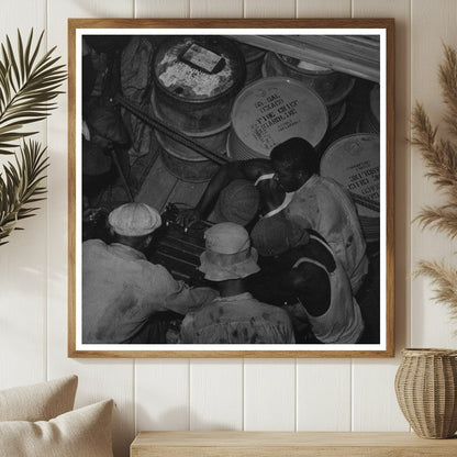 Stevedores Handling Drum in New Orleans 1938 - Available at KNOWOL