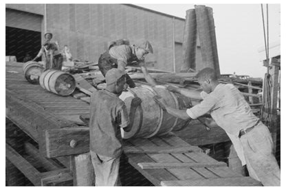 Stevedores Handling Drums at New Orleans Waterfront 1938 - Available at KNOWOL