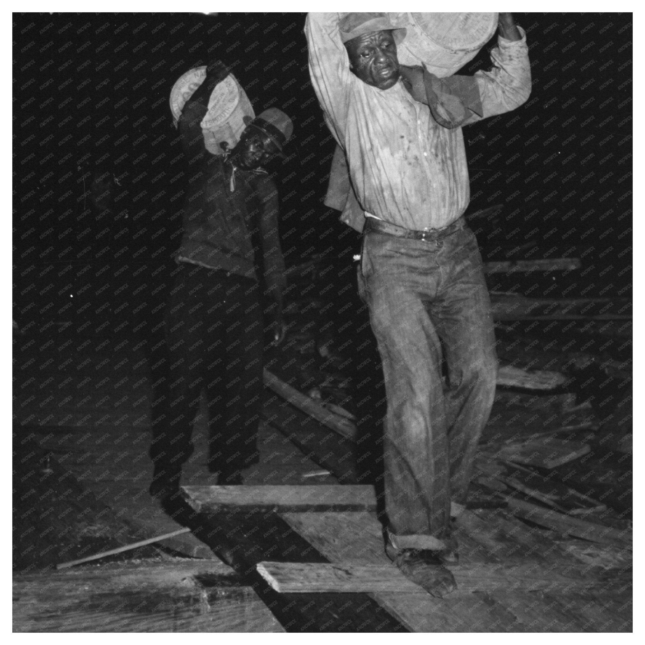 Stevedores Handling Drums in New Orleans 1938 - Available at KNOWOL