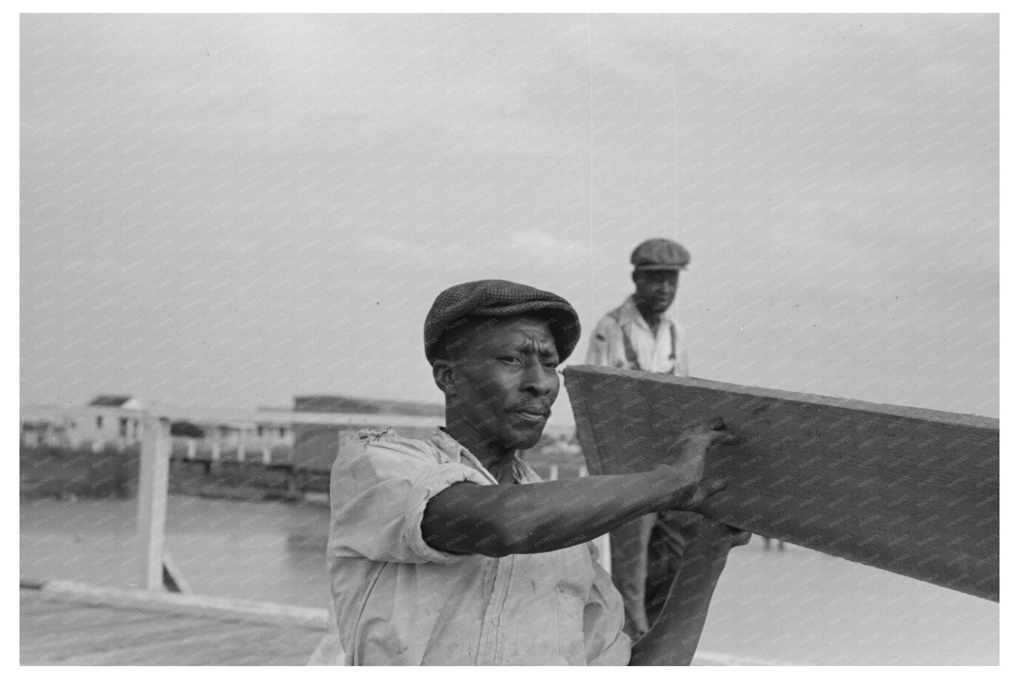 Stevedores Unloading Lumber at Pilottown Louisiana 1938 - Available at KNOWOL