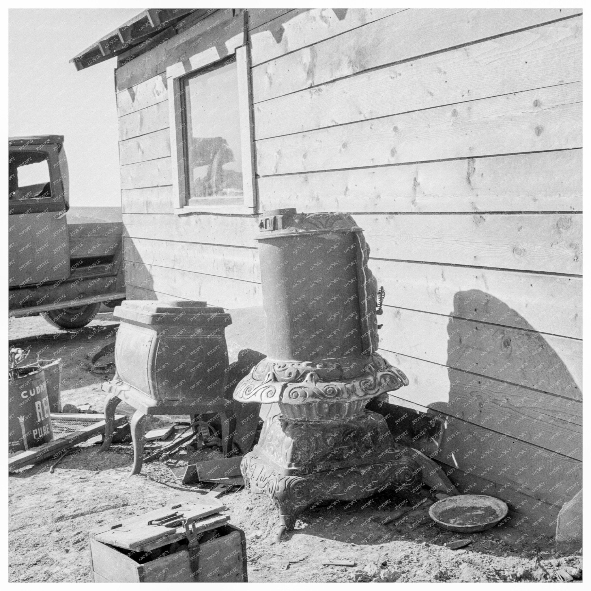 Stoves Being Repaired Outside Browning House Oregon 1939 - Available at KNOWOL