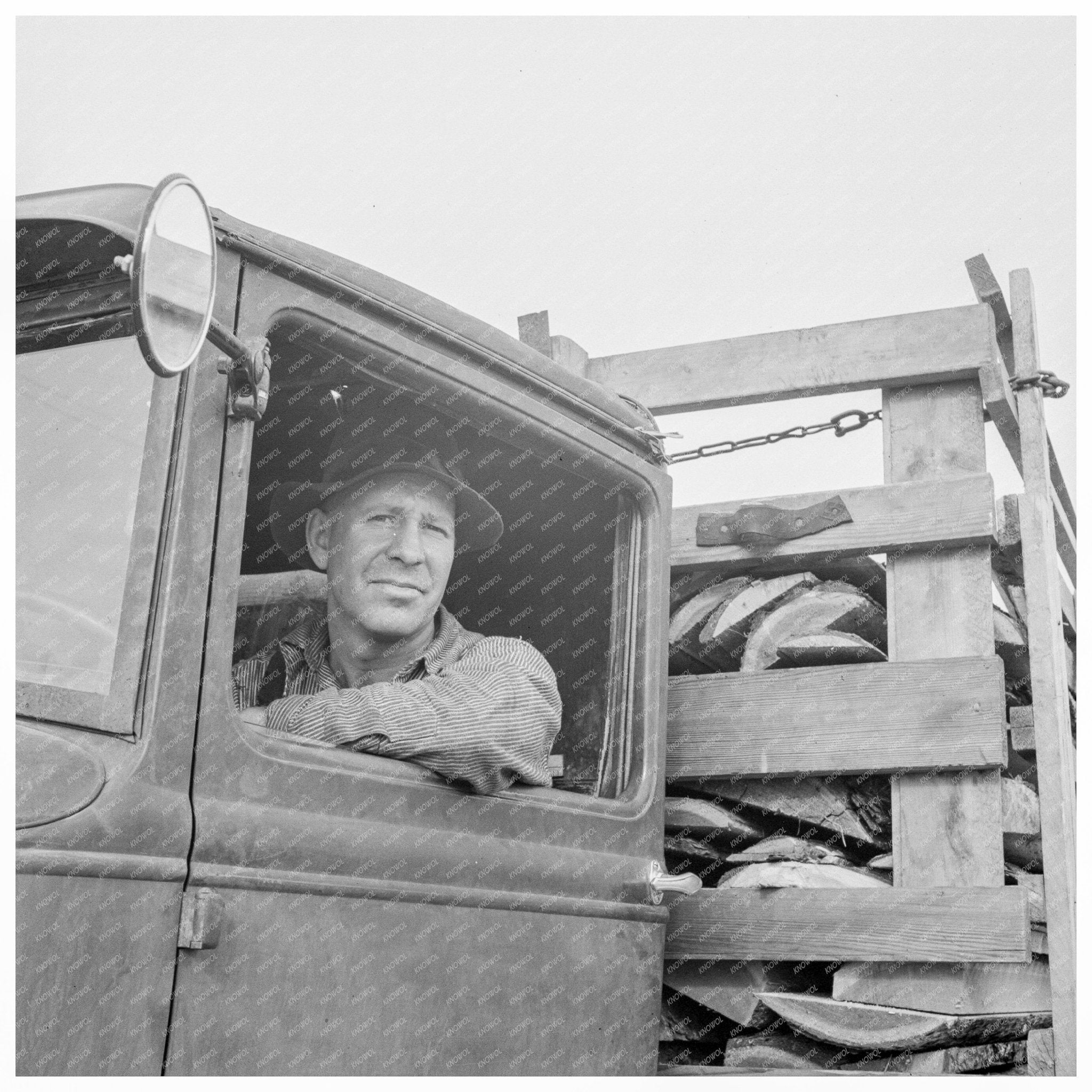 Stump Farmer Hauling Slab Wood Bonner County Idaho 1939 - Available at KNOWOL