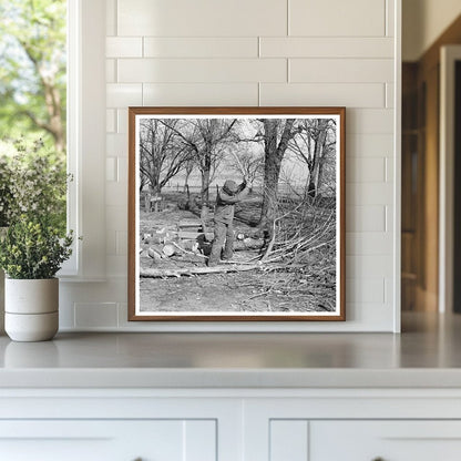 Sylvester Garring Chopping Wood in Indiana March 1937 - Available at KNOWOL