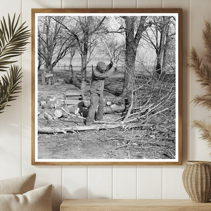 Sylvester Garring Chopping Wood in Indiana March 1937 - Available at KNOWOL