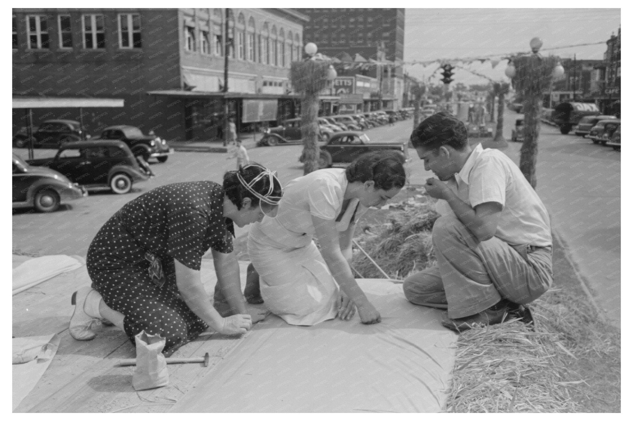 Tacking Canvas at National Rice Festival Crowley 1938 - Available at KNOWOL