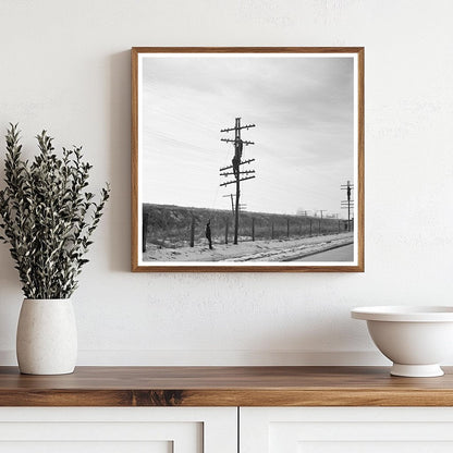 Telephone Linesmen Raising Wires Above Flood Level 1937 - Available at KNOWOL