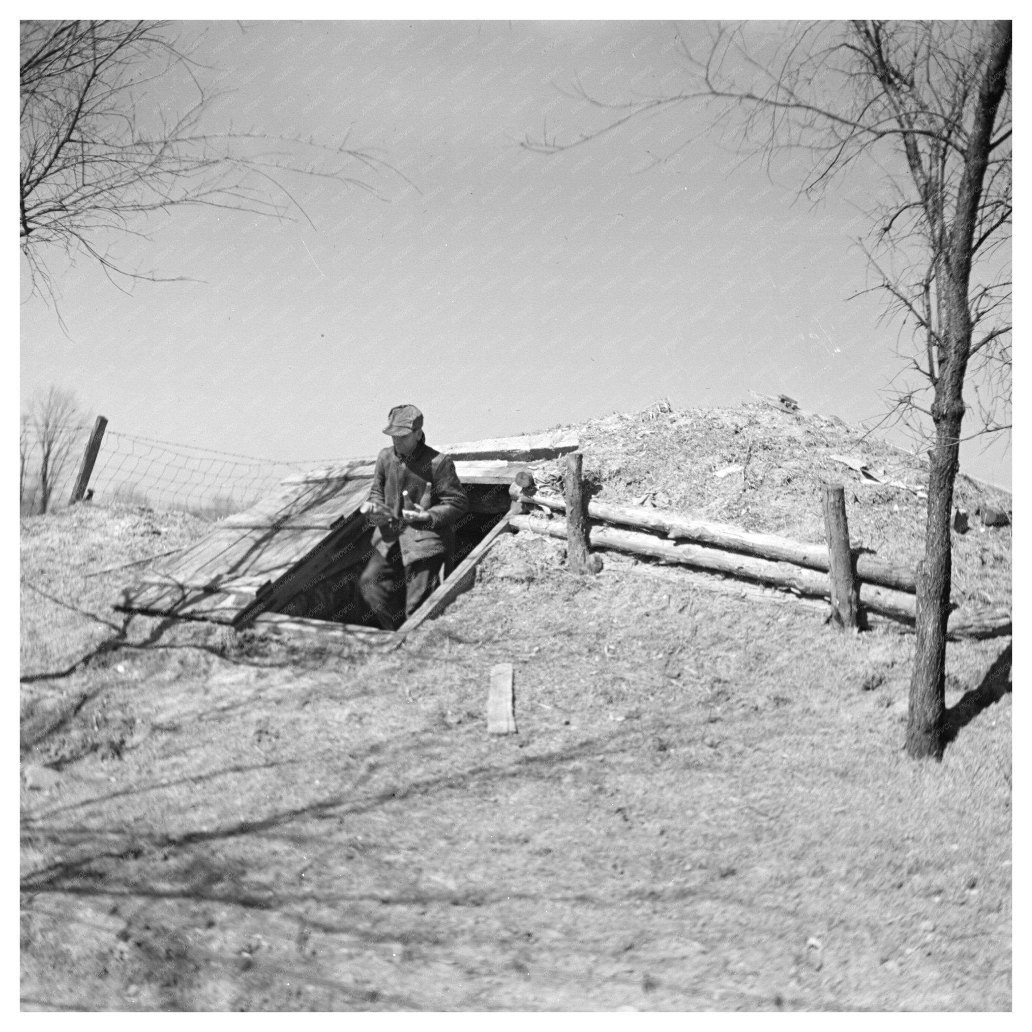 Tenant Farmer Carrying Fruit March 1937 - Available at KNOWOL