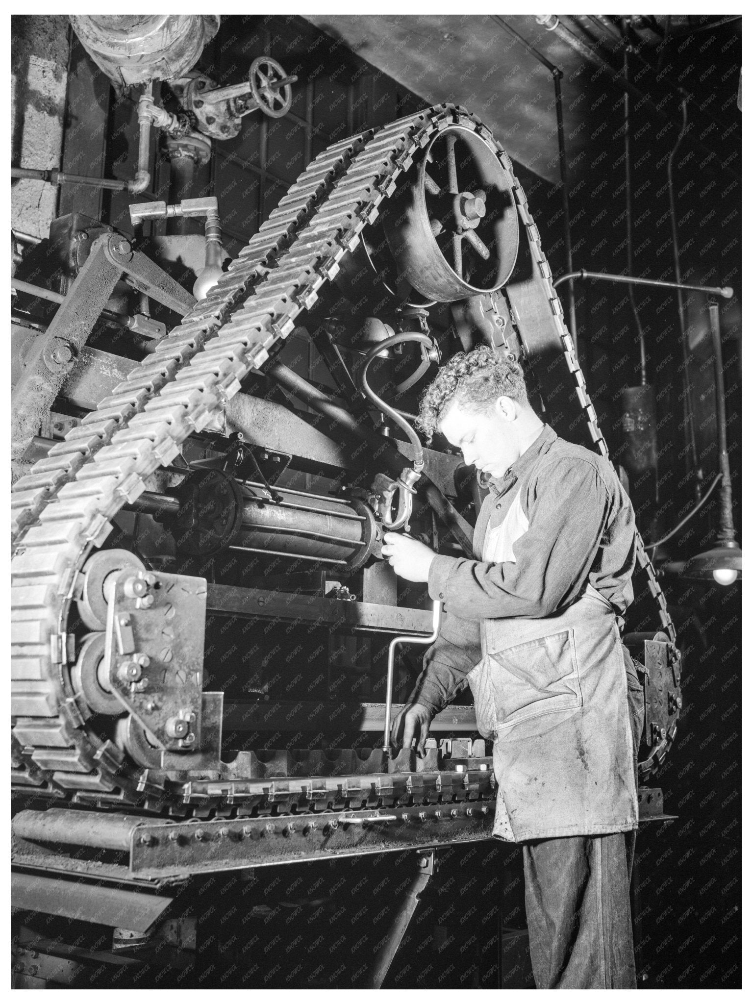 Tire Plant Workers Assembling Army Vehicle Parts 1941 - Available at KNOWOL