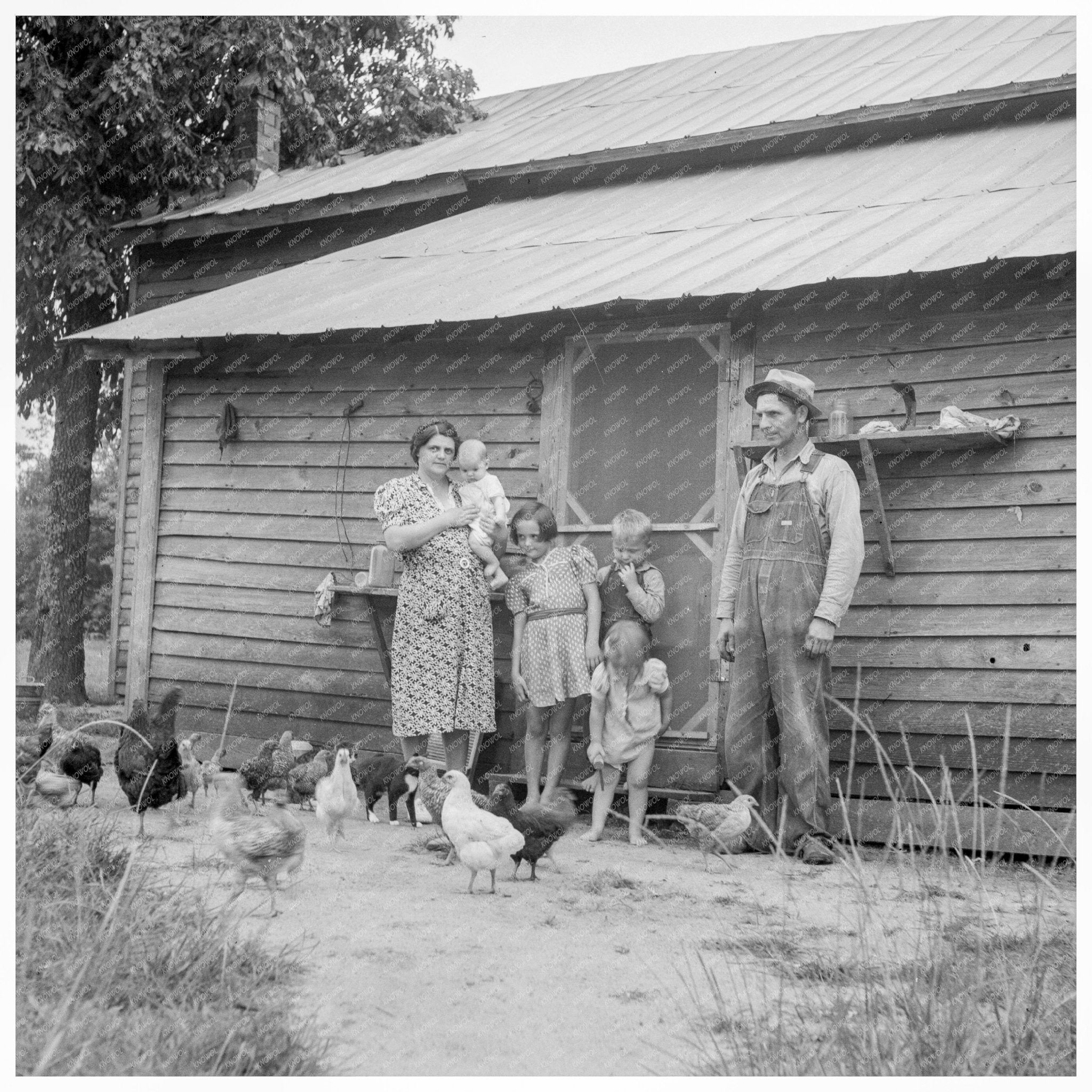 Tobacco Sharecropper with Daughter Person County 1939 - Available at KNOWOL