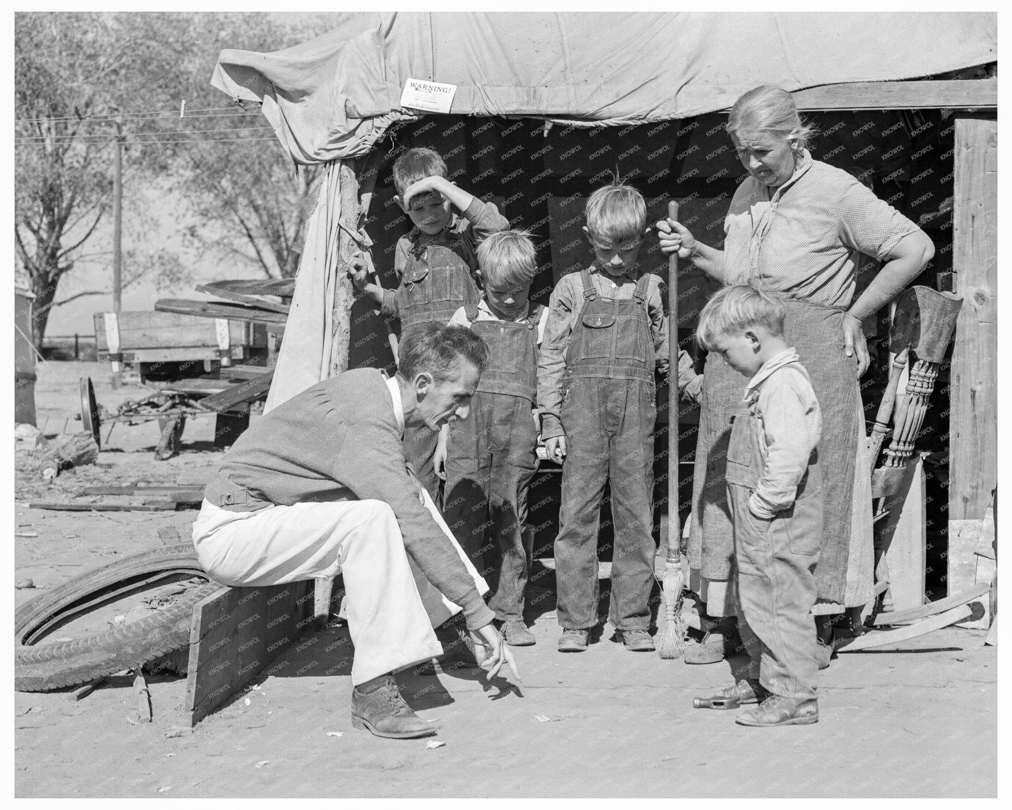 Tom Collins with Drought Refugee and Sons 1936 - Available at KNOWOL