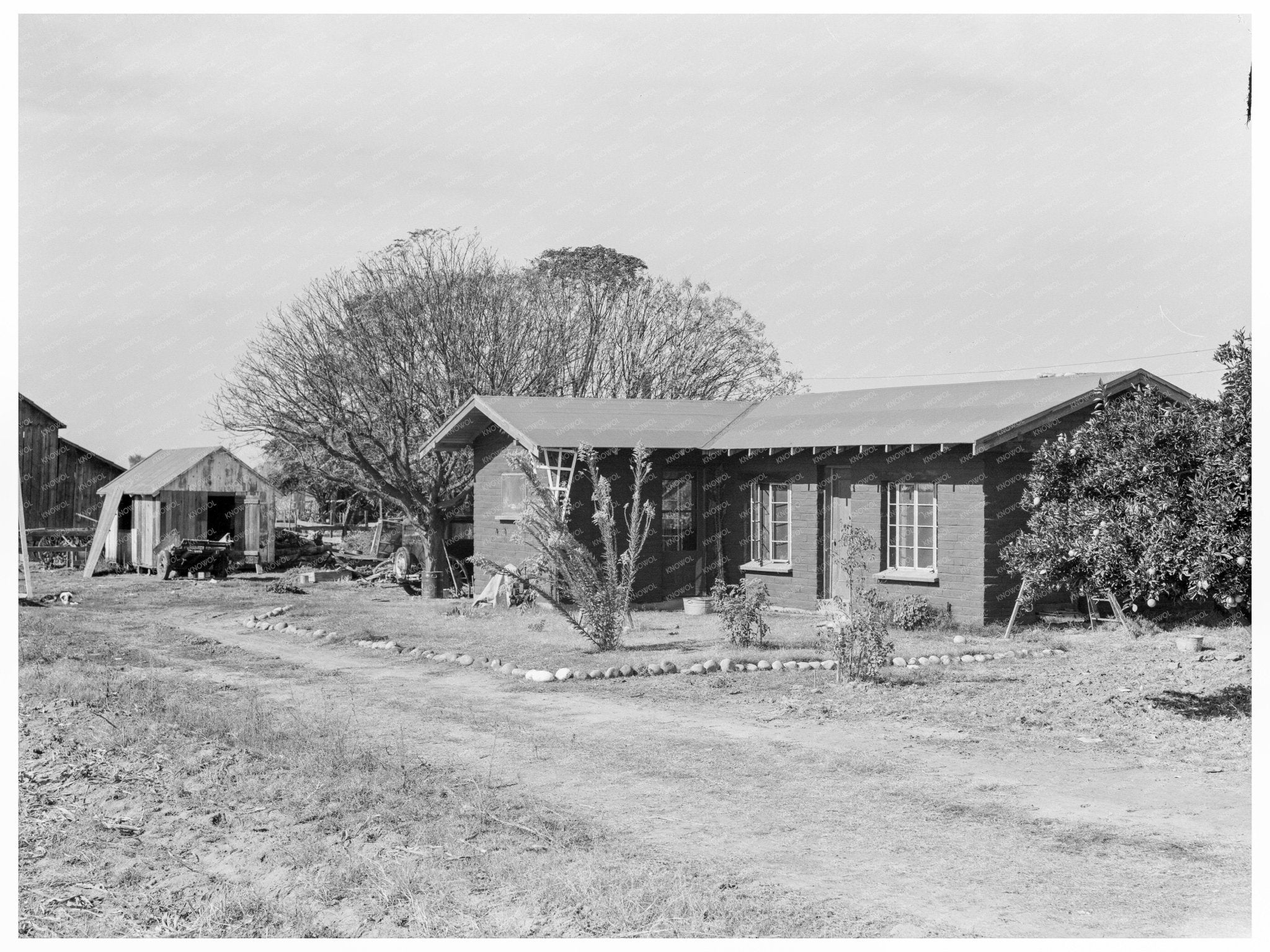 Tulare County Family with Irrigating Pump 1938 - Available at KNOWOL