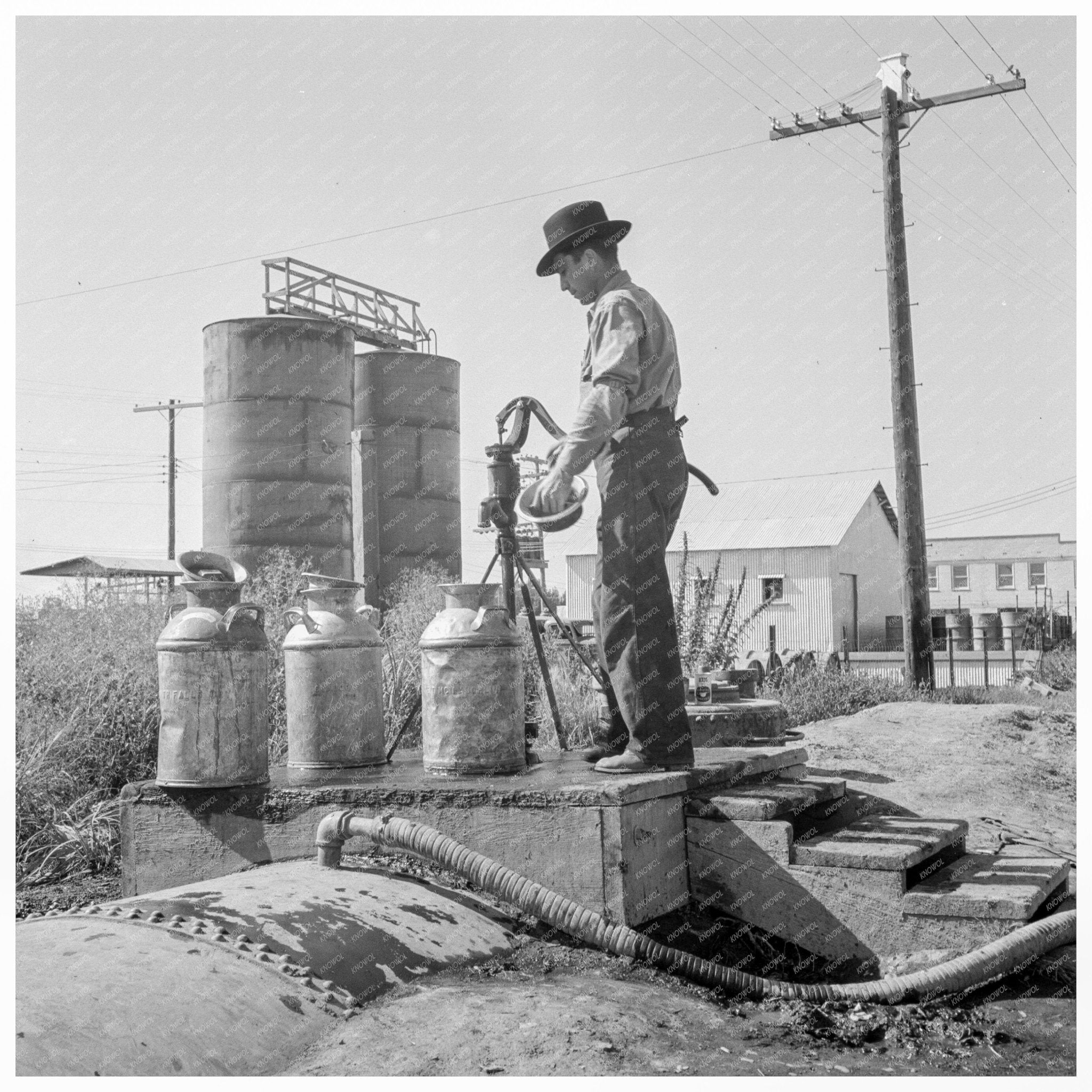 Tulelake Water Source with Migrant Camp August 1939 - Available at KNOWOL