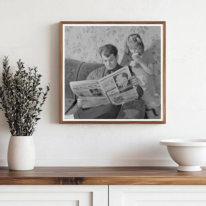 Victor Rauh Reading Newspaper with Child Butte Montana 1942 - Available at KNOWOL