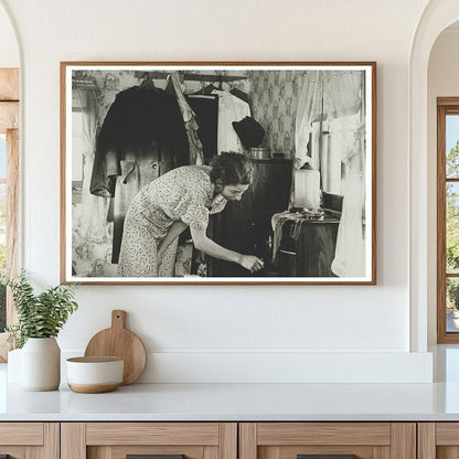 Vintage 1936 Photograph of Woman Winding Clock in Shack - Available at KNOWOL