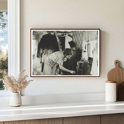 Vintage 1936 Photograph of Woman Winding Clock in Shack - Available at KNOWOL