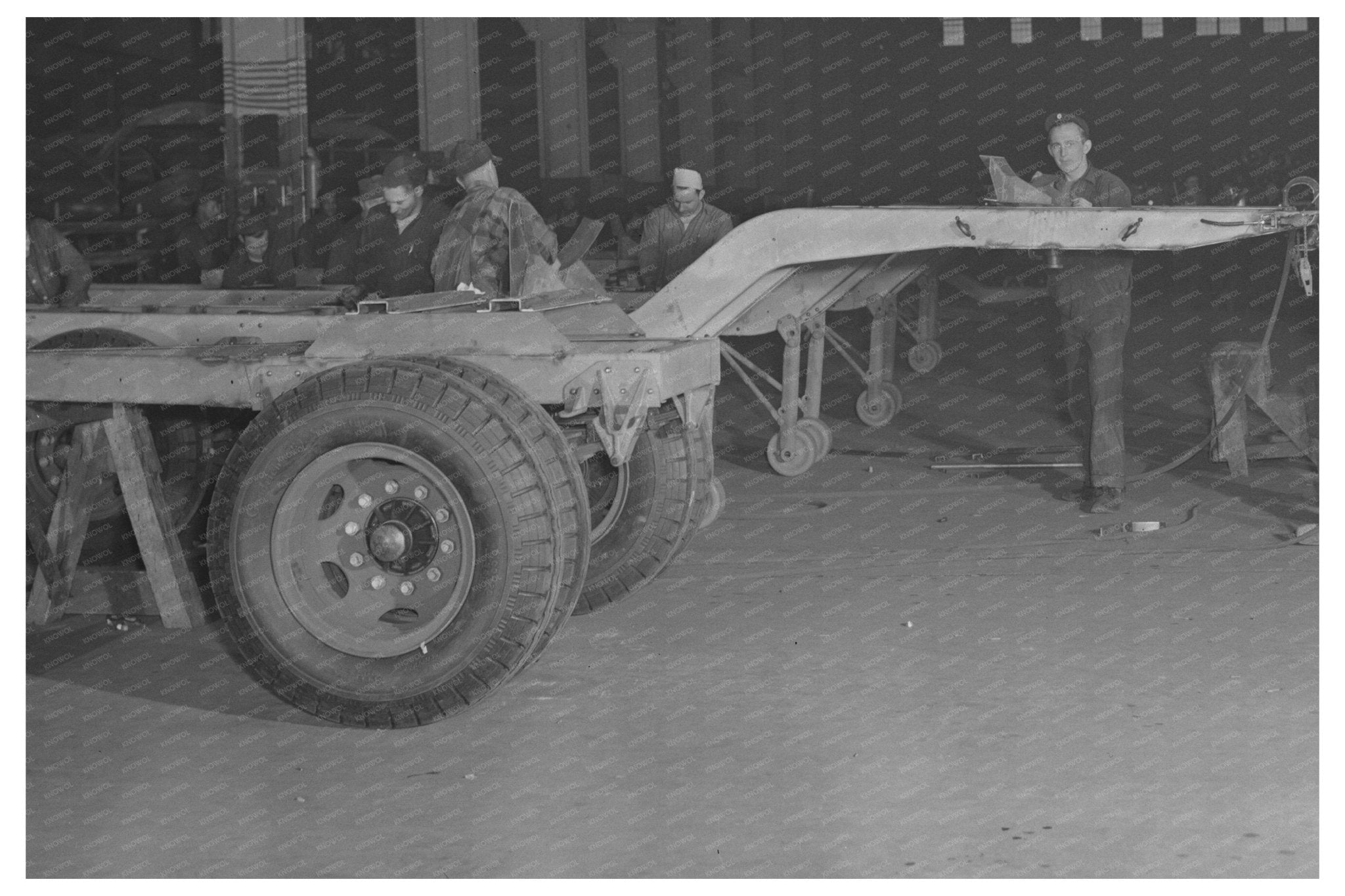 War Production Workers Assembling Chassis February 1943 - Available at KNOWOL