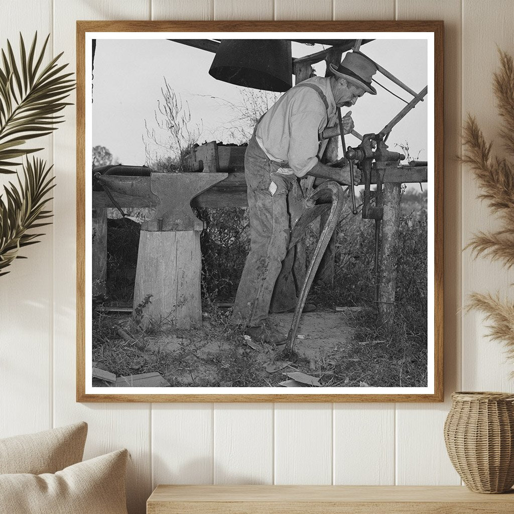 W.E. Smith Blacksmithing a Plow 1938 Morganza Louisiana - Available at KNOWOL