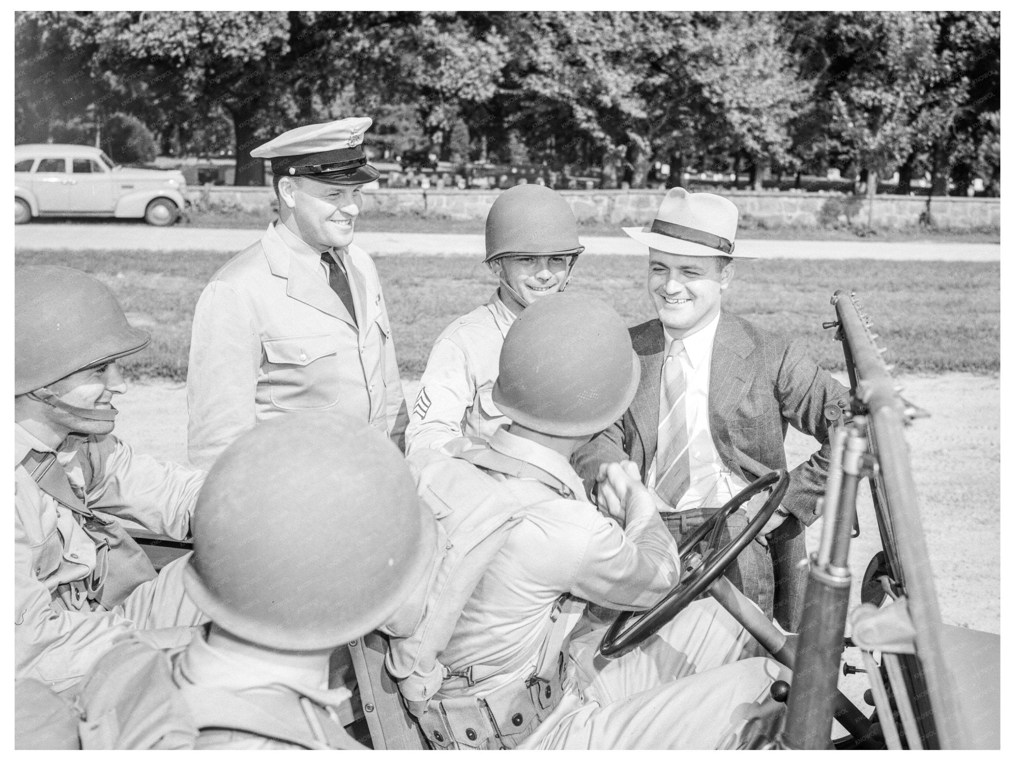 Welder George Woolslayer with Soldiers August 1942 - Available at KNOWOL