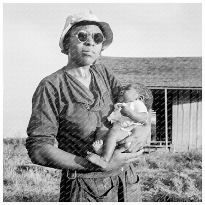 Wife and Child of Tractor Driver at Aldridge Plantation 1937 - Available at KNOWOL