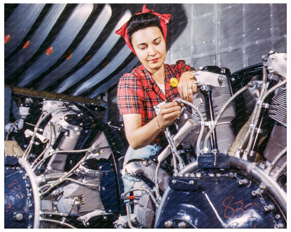 Woman Assembling Airplane Motor in 1942 - Available at KNOWOL