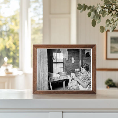 Woman Bathing Baby in Kitchen North Carolina 1939 - Available at KNOWOL