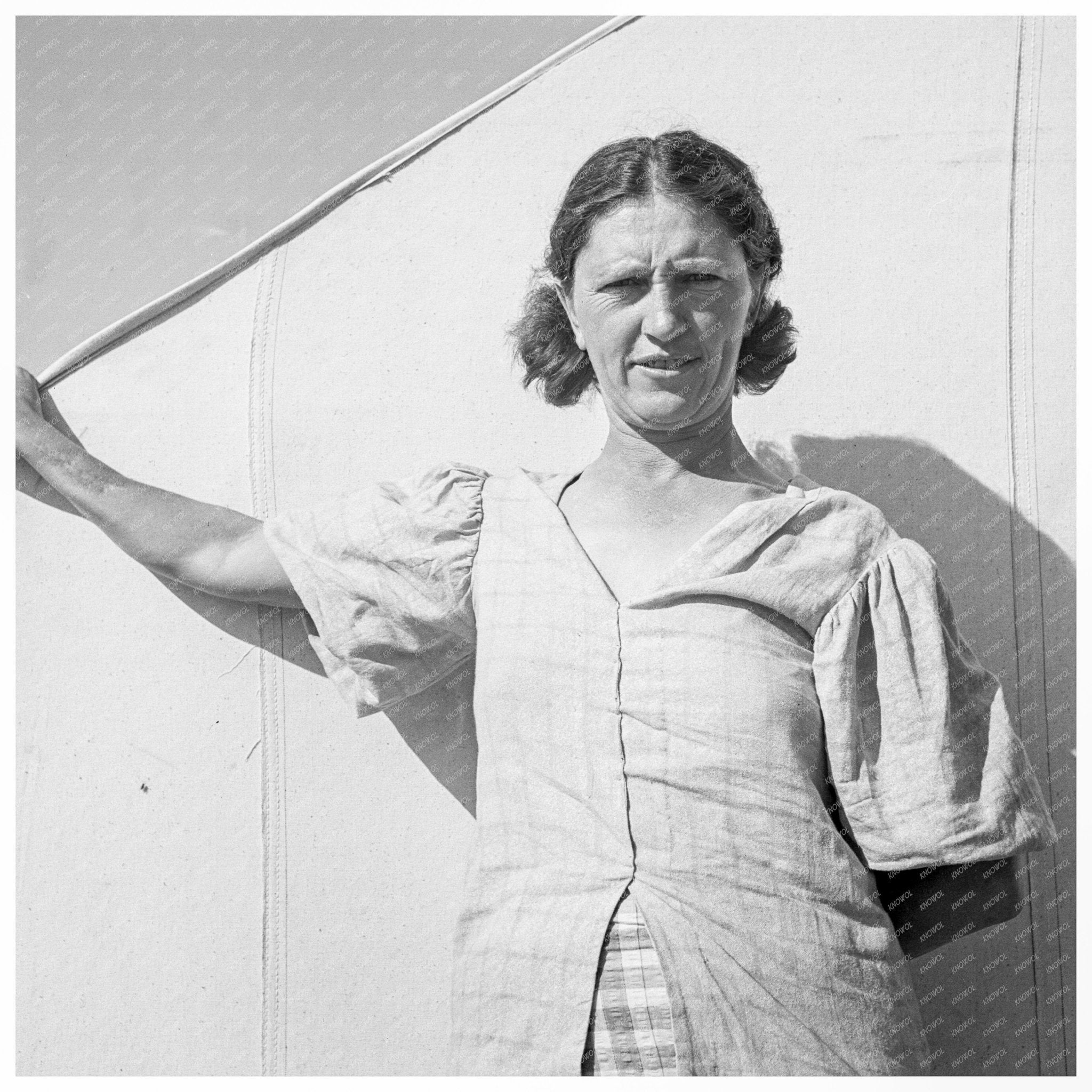 Woman in Carrot Pickers Camp Imperial Valley 1939 - Available at KNOWOL