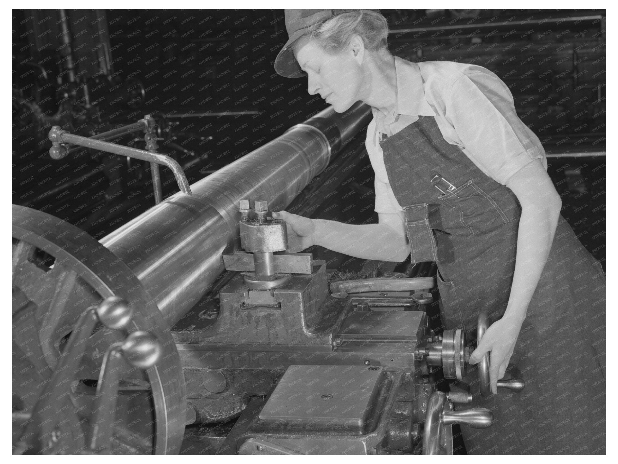 Woman Inspects M7 Gun at Milwaukee War Facility 1943 - Available at KNOWOL