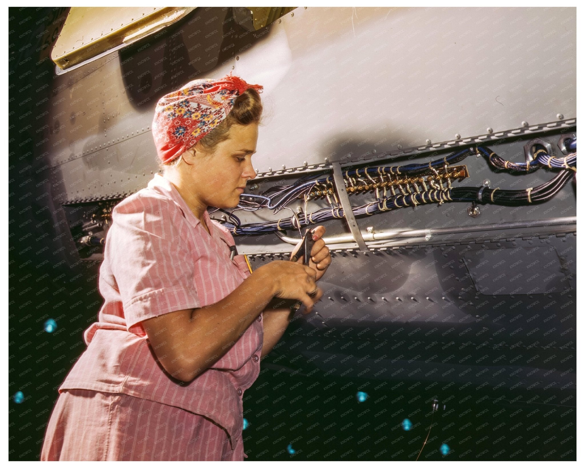 Women Assembling Aircraft at Douglas in WWII October 1942 - Available at KNOWOL