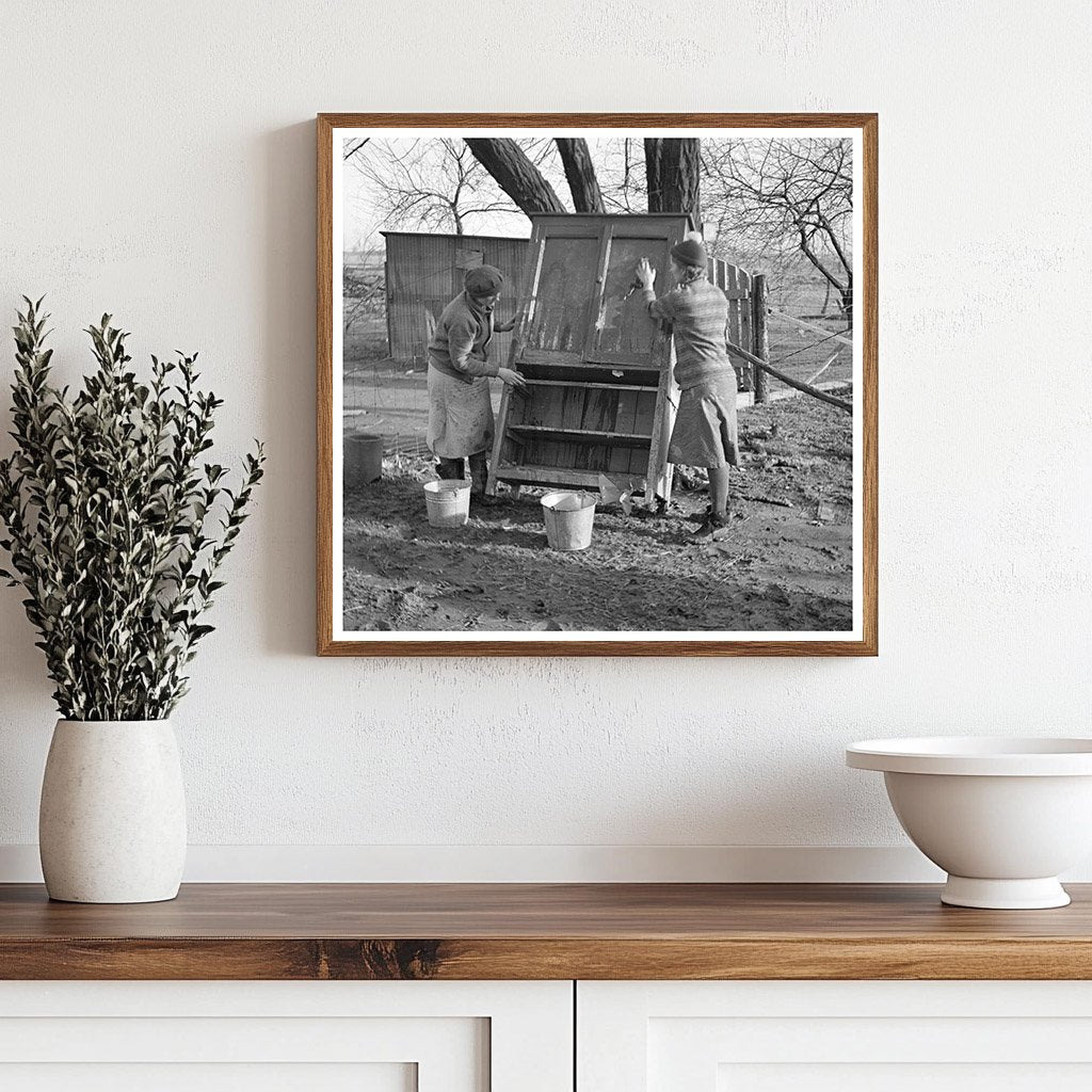 Women Cleaning Flood - Damaged Furniture in Indiana 1937 - Available at KNOWOL