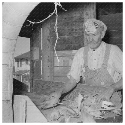 Worker at Feed Mill Taylor Texas November 1939 - Available at KNOWOL