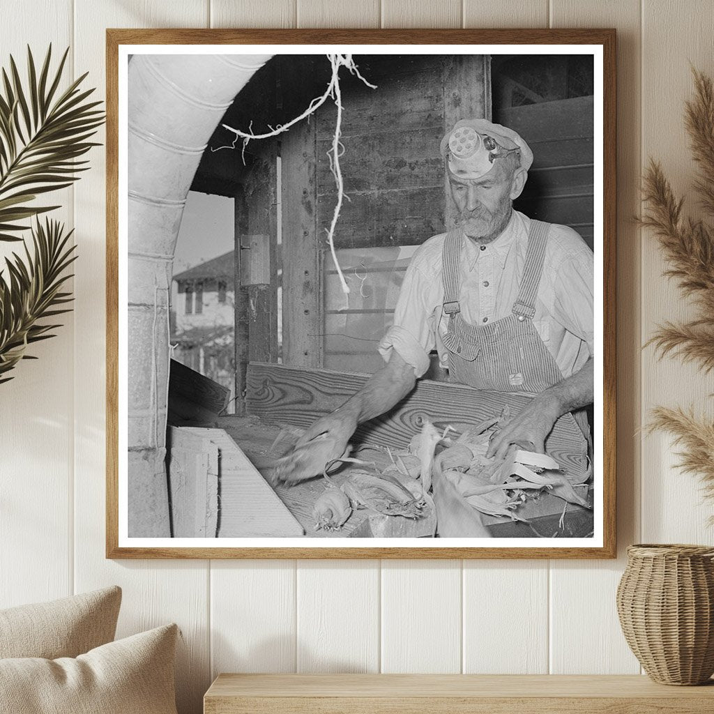 Worker at Feed Mill Taylor Texas November 1939 - Available at KNOWOL