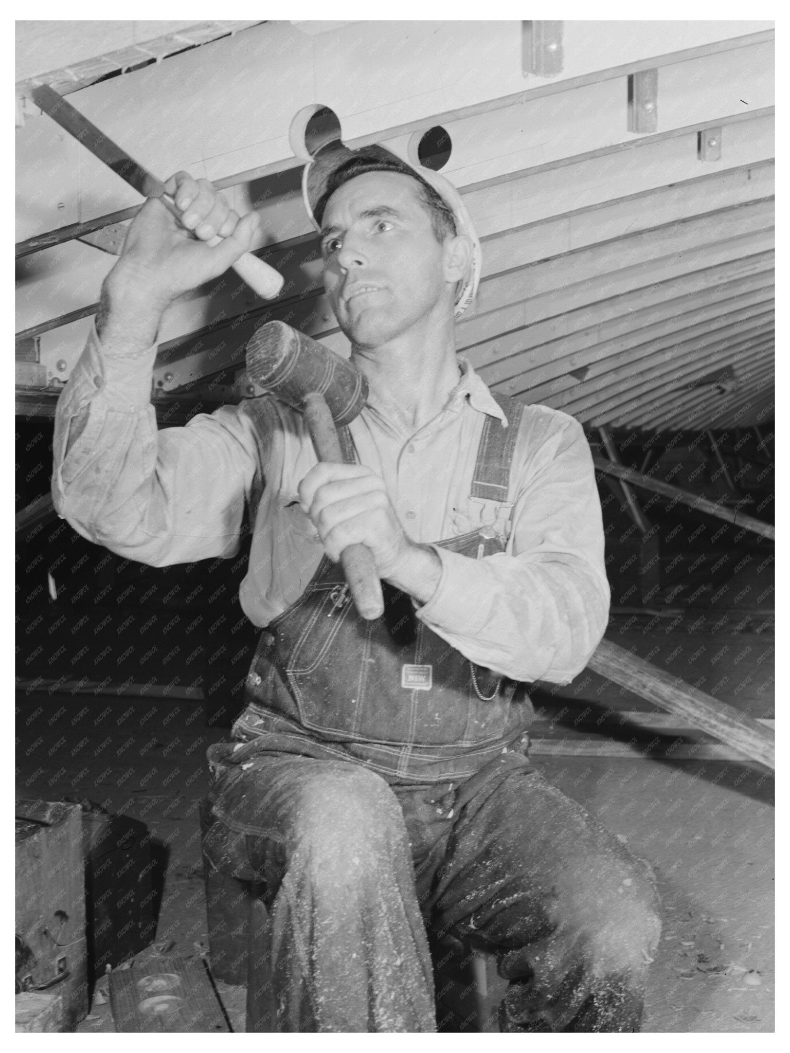 Worker Chiseling Beam on Motor Torpedo Boat July 1942 - Available at KNOWOL