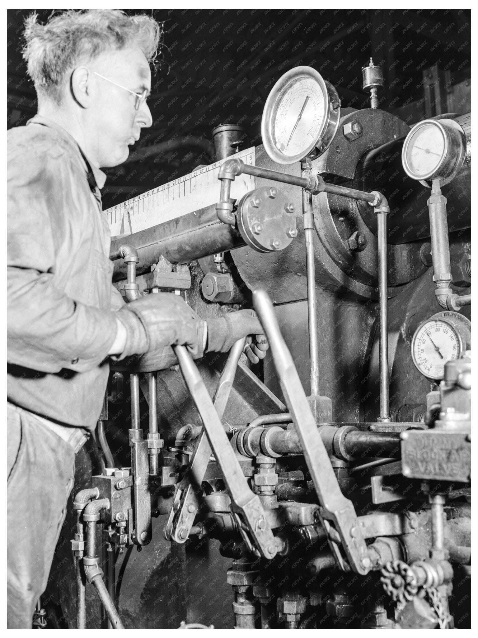 Worker Operating Extruding Machine in 1942 Ohio - Available at KNOWOL