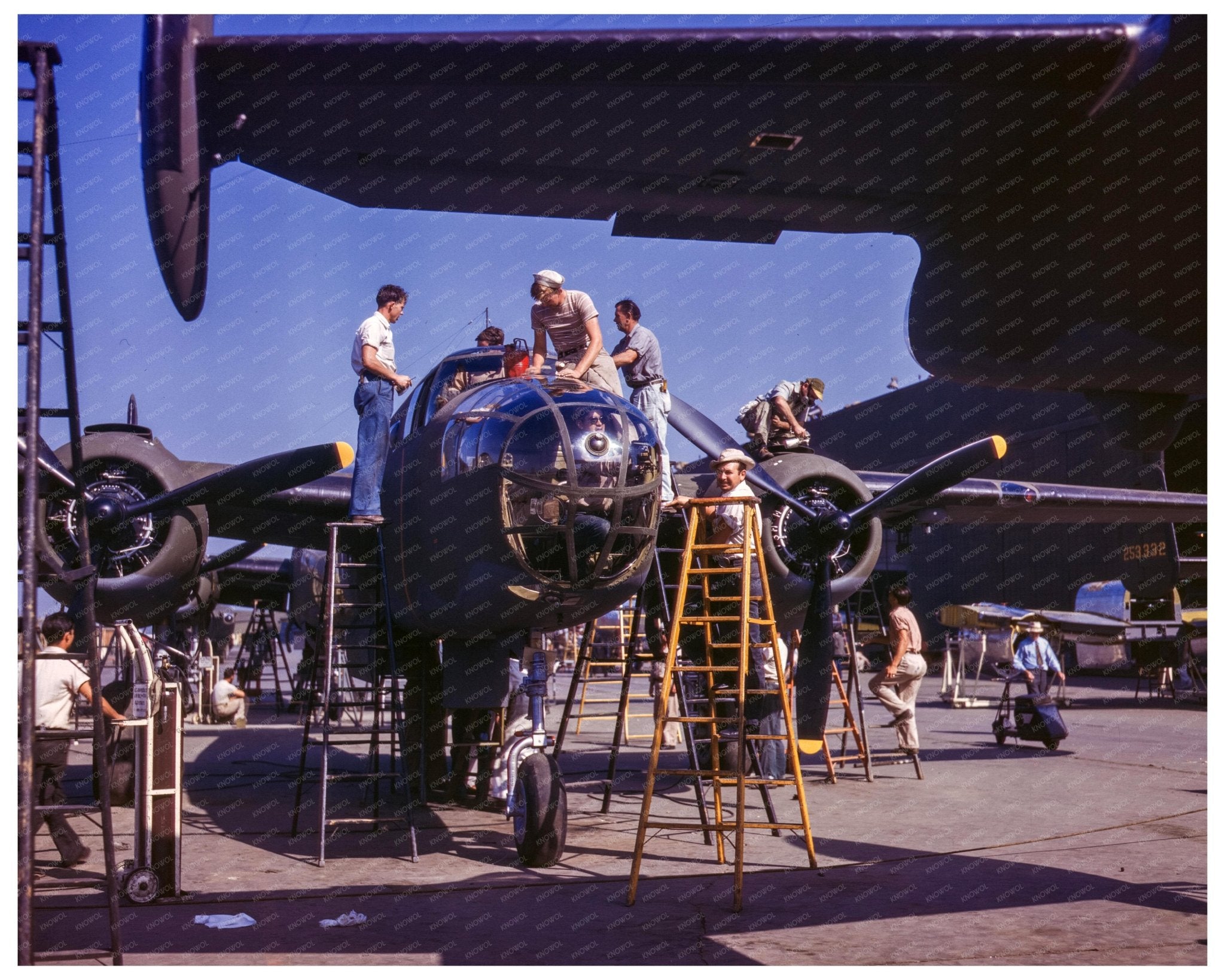 Workers Assemble B - 25 Bomber at North American Aviation 1942 - Available at KNOWOL