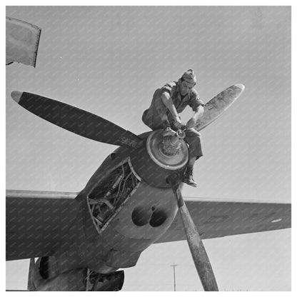 Workers Maintaining Interceptor Plane in May 1942 - Available at KNOWOL