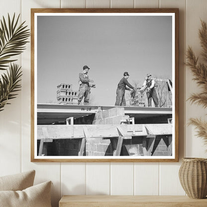 Workers Passing Cinder Blocks on Rooftop Greendale 1937 - Available at KNOWOL