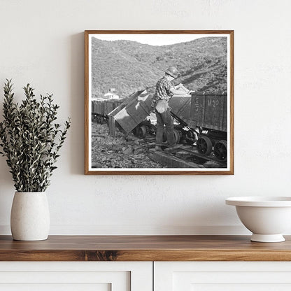 Workman Detaching Mine Cars at Boriana Mine Circa 1940 - Available at KNOWOL