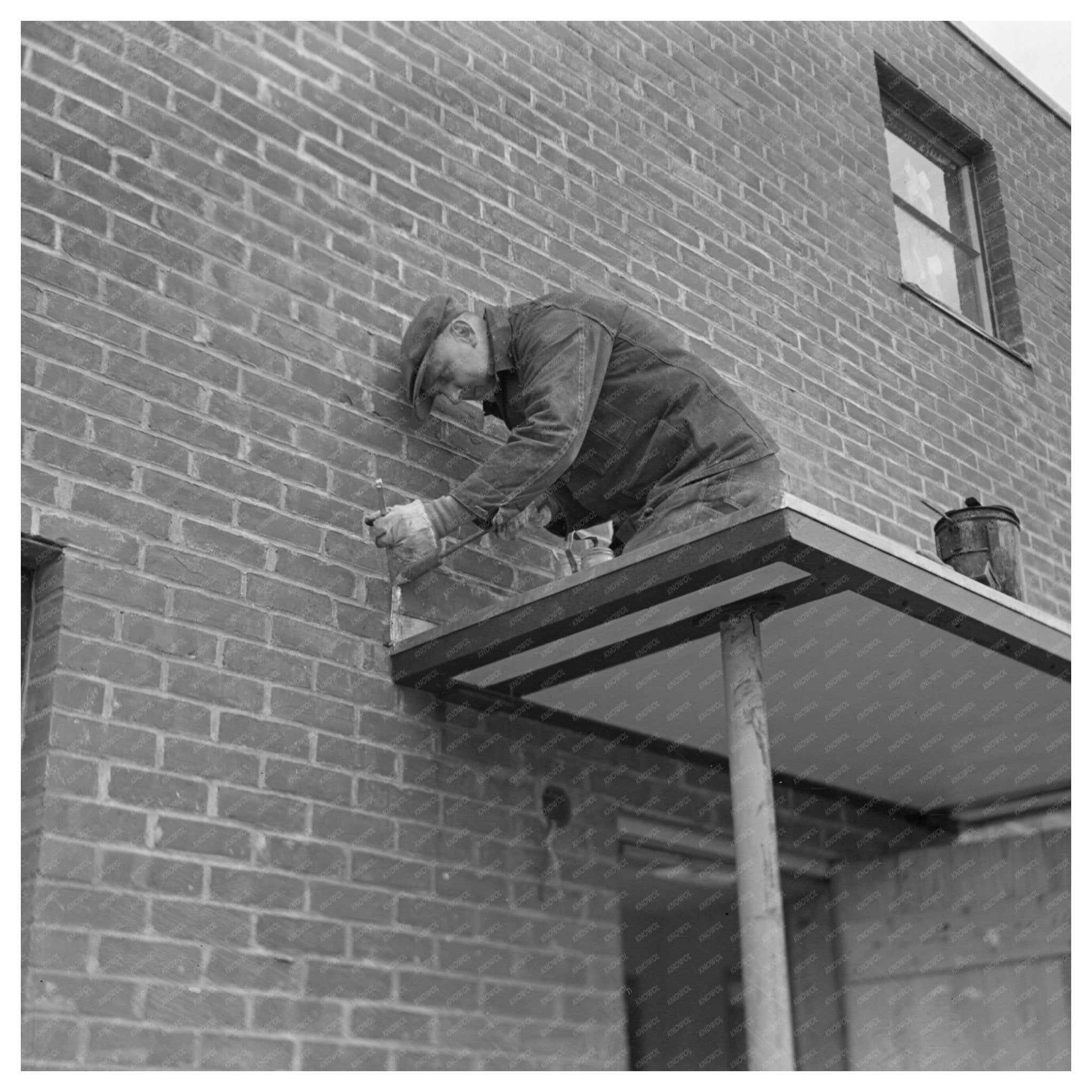 Workmen Solder Metal Trim on Roof Greenhills Ohio 1937 - Available at KNOWOL