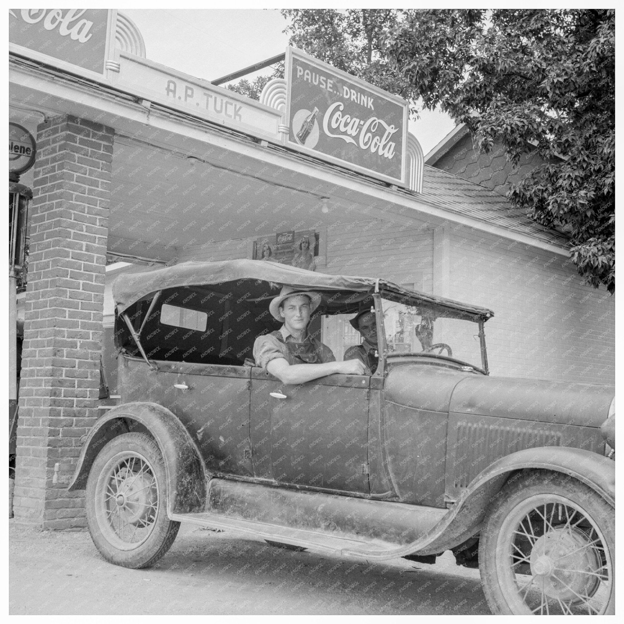 Young Man by Ford at Tucks Filling Station 1939 - Available at KNOWOL