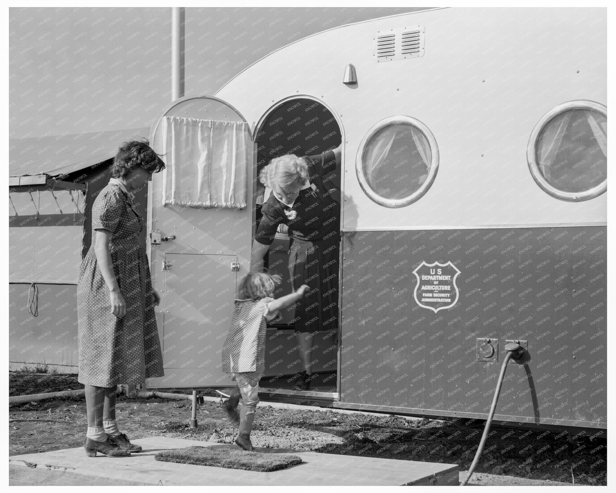 Young Mother and Child at Trailer Clinic Oregon 1939 - Available at KNOWOL