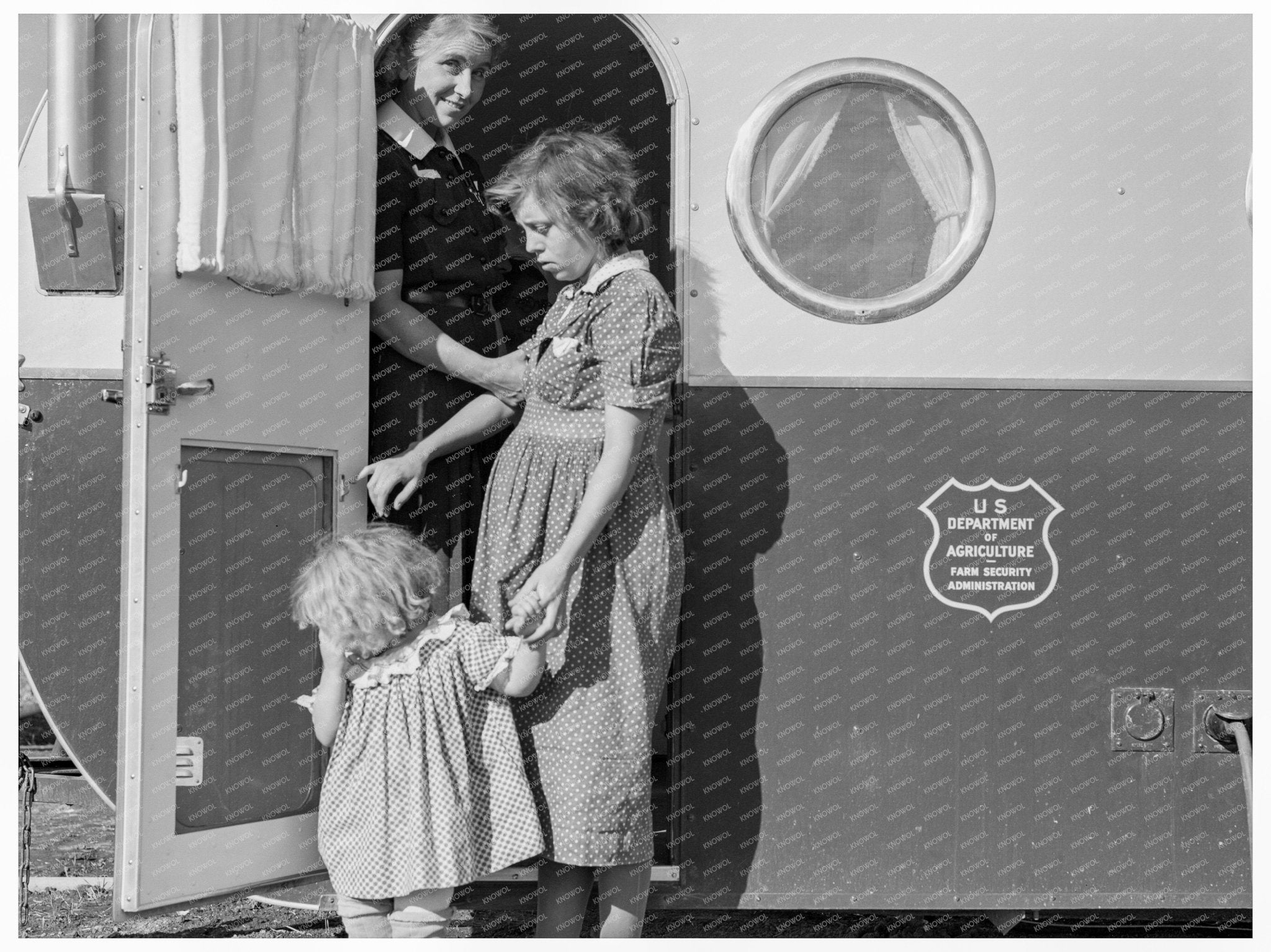 Young Mother and Child Visit Trailer Clinic Oregon 1939 - Available at KNOWOL