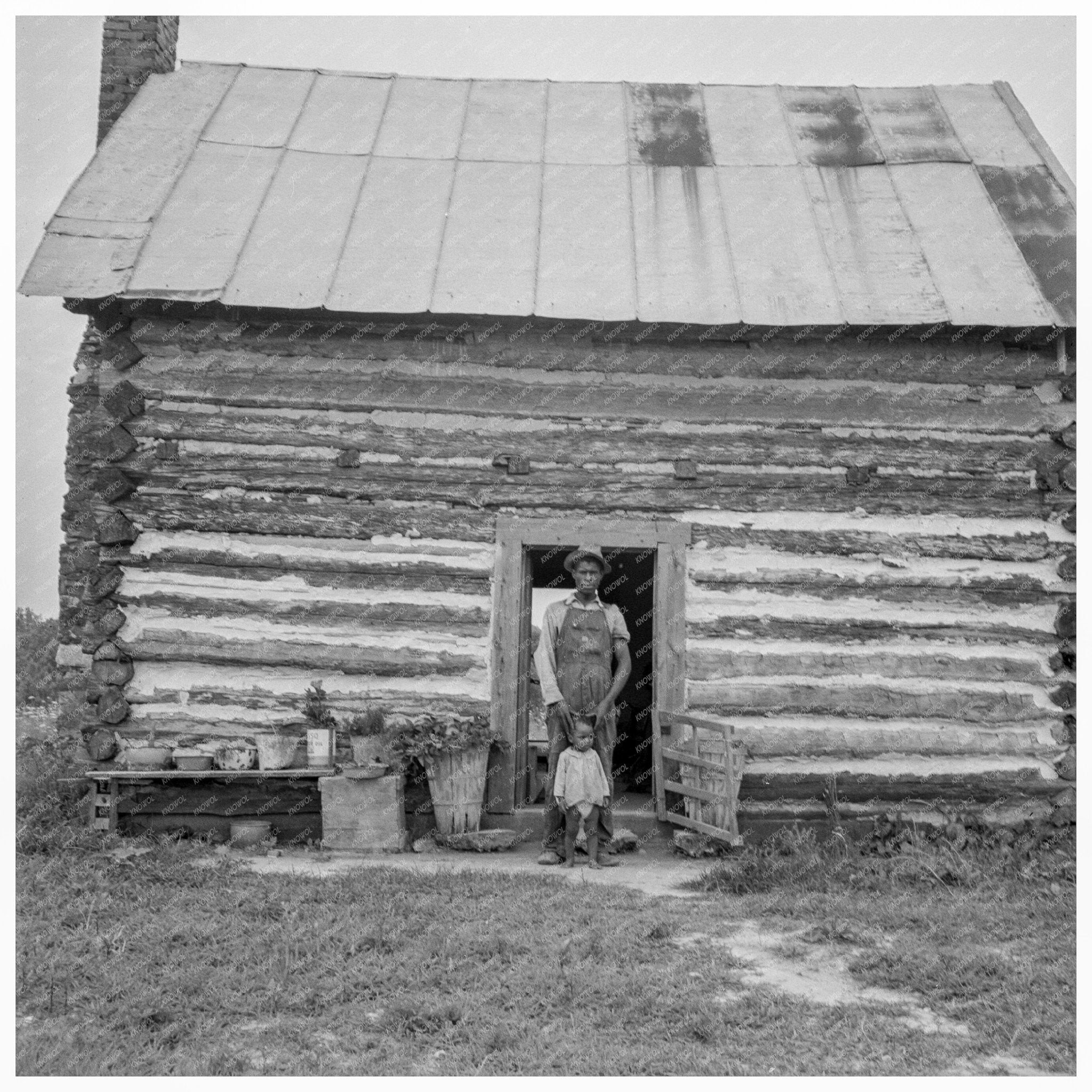 Young Sharecropper and Child Hillside Farm 1939 - Available at KNOWOL