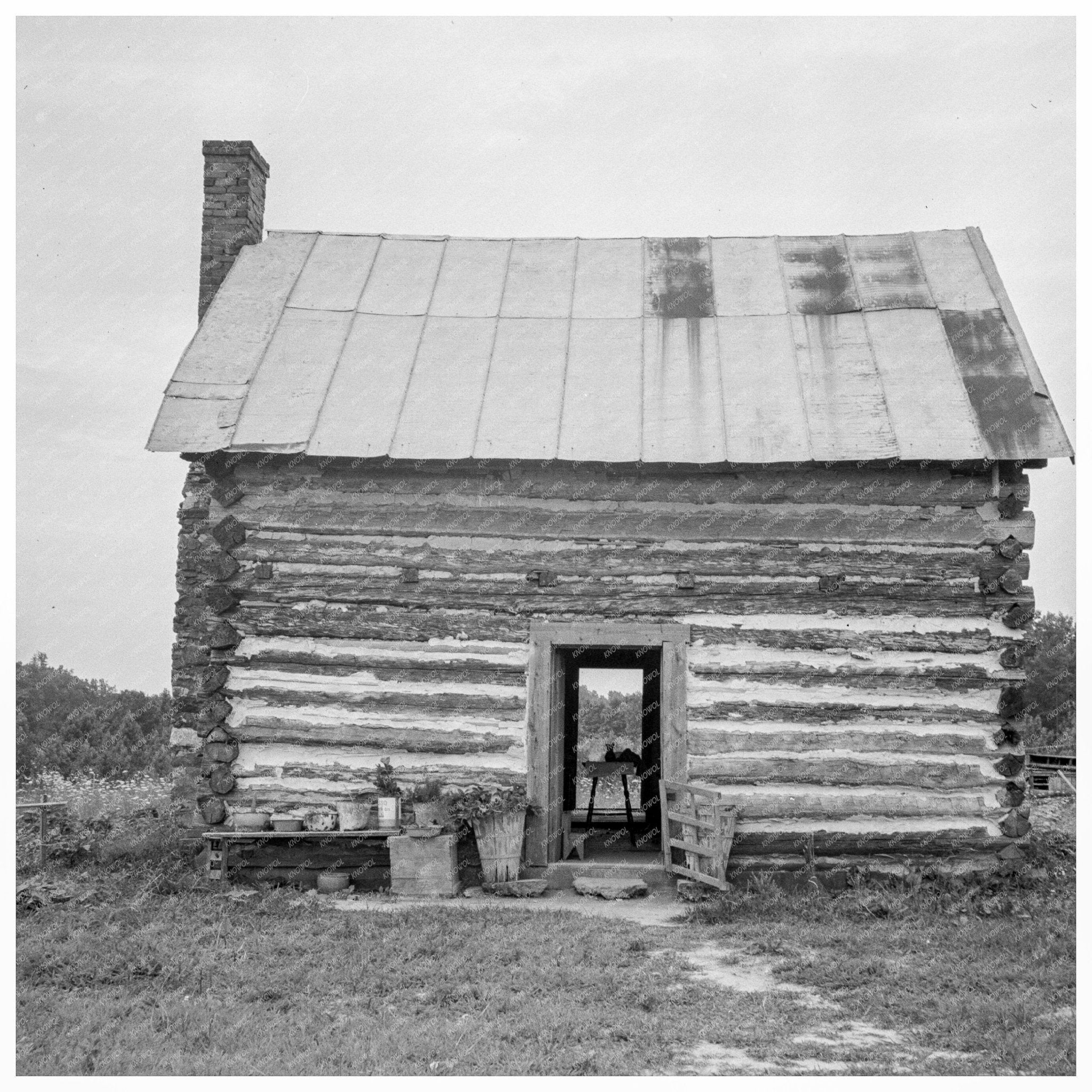 Young Sharecropper with Child at Hillside Farm 1939 - Available at KNOWOL