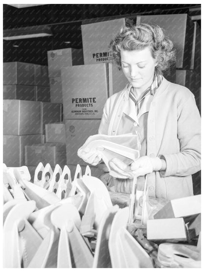 Young Woman Inspecting Alloy Castings in 1942 Factory - Available at KNOWOL