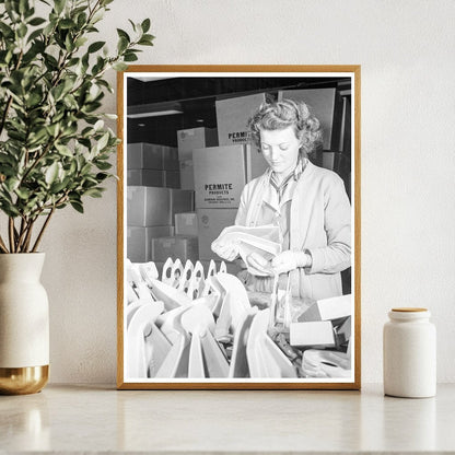 Young Woman Inspecting Alloy Castings in 1942 Factory - Available at KNOWOL